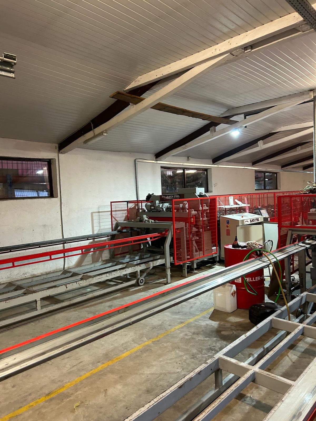 Factory floor with automated conveyor systems and production line monitoring for MES integration