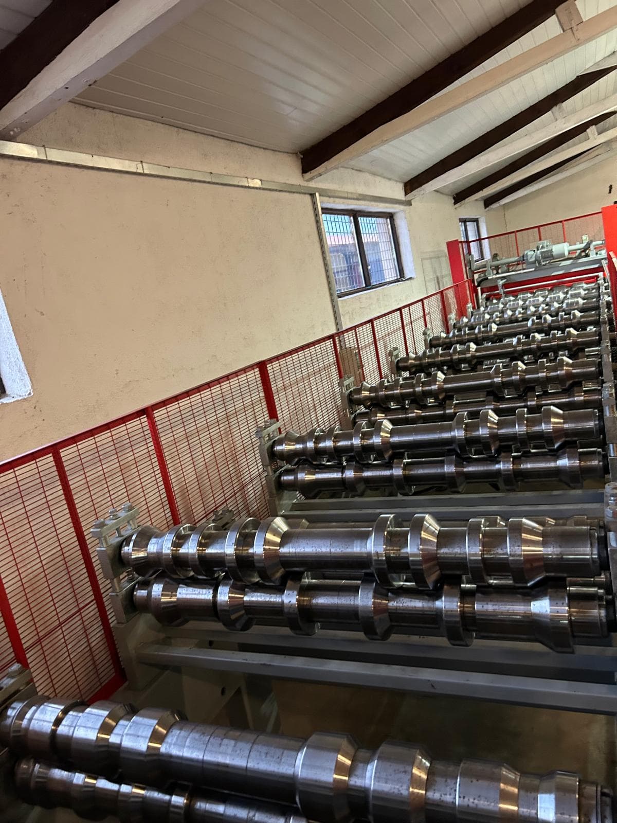 Precision machined forming rollers used in automated production lines requiring custom PCB-controlled systems